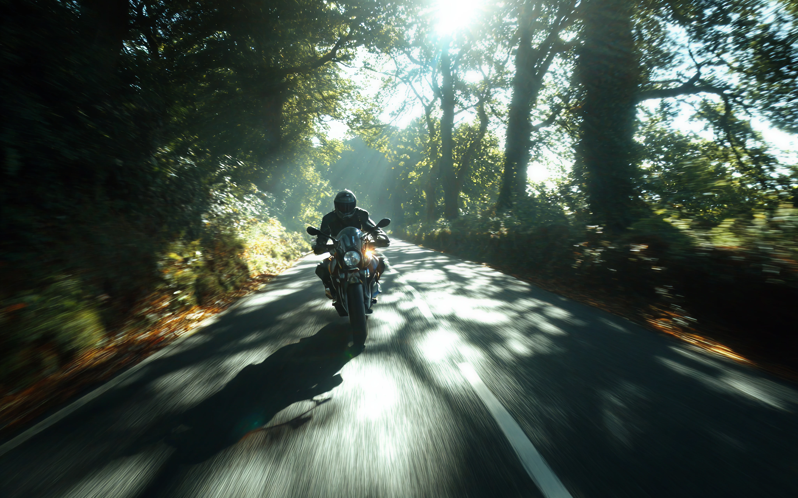 motorcyclist driving towards camera